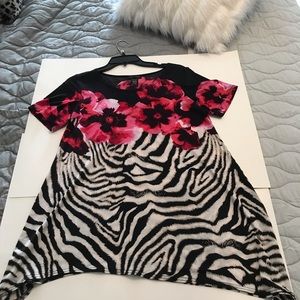 Beautiful asymmetrical top by Isabel